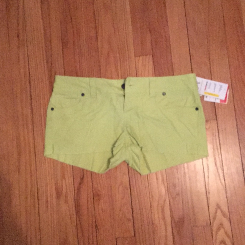 Shorts ladies bright lime green. UNDER ARMOUR